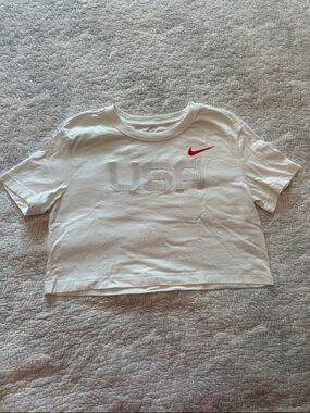 Nike Women’s White USA Graphic Tee with Red Swoosh